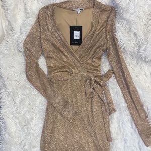 Brand new Rose gold long sleeve shimmery dress